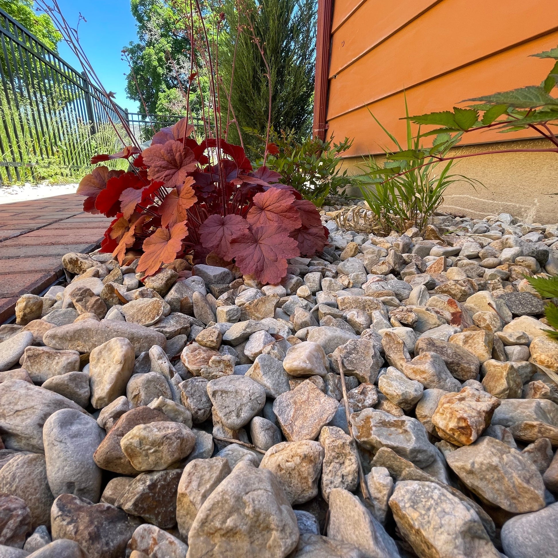 Yellow or Tan colored landscape rock from Missoula Dirt Delivery small dump truck service