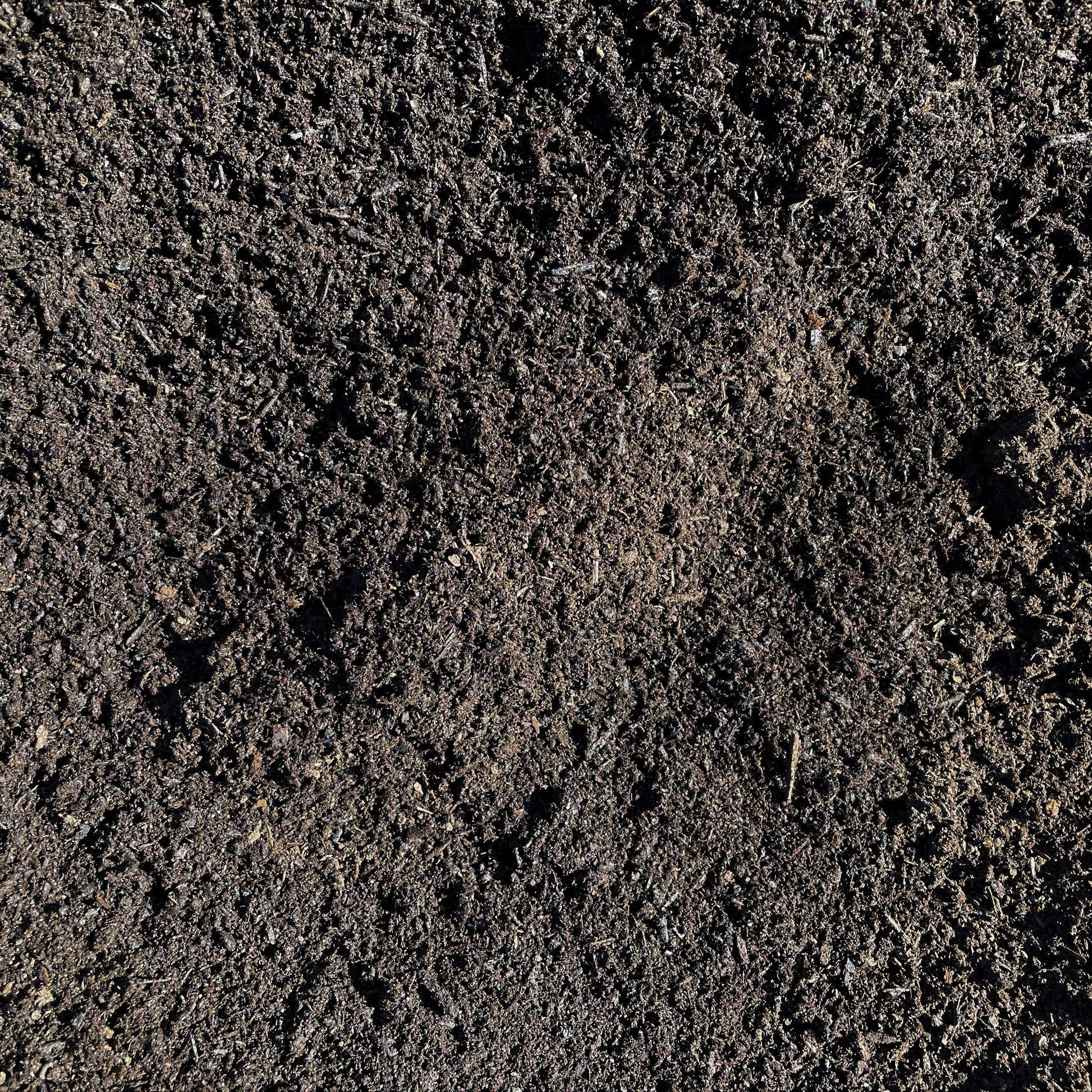 Finely screened lawn top dress overhead view