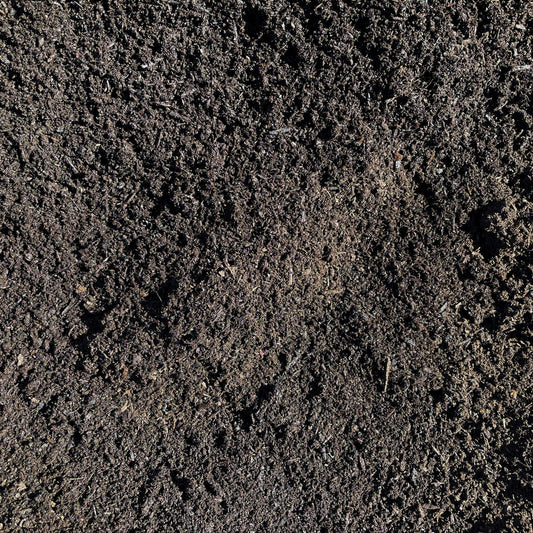 Finely screened lawn top dress overhead view