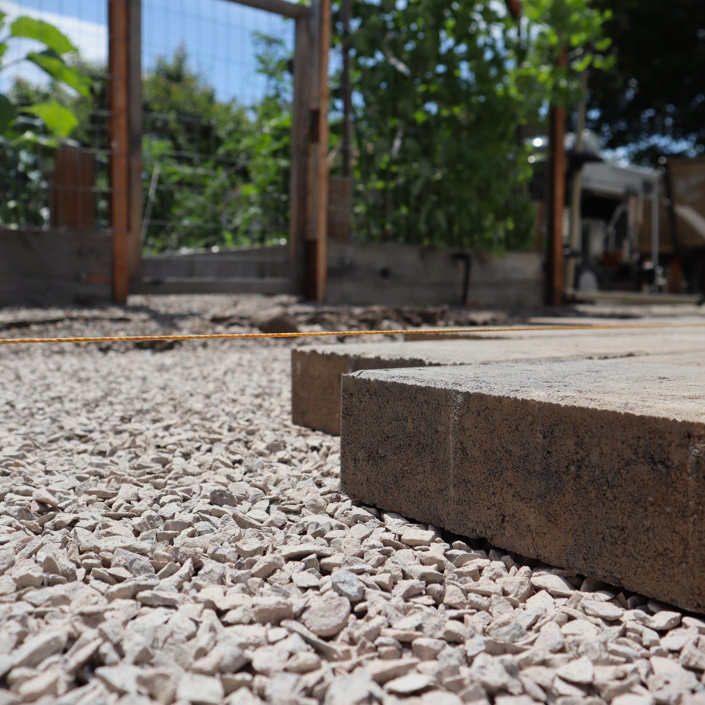 A paver patio installation on gravel delivered by Missoula Dirt Delivery