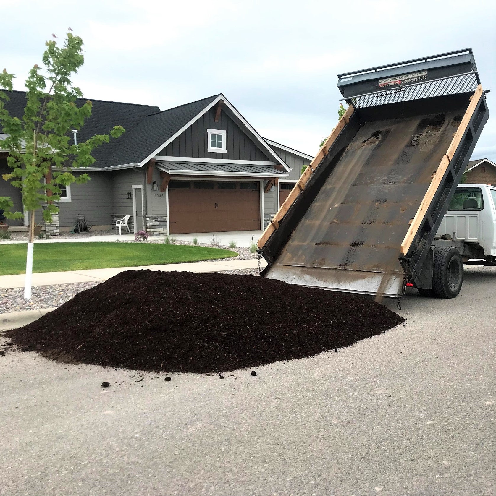 A little dump of Garden Box / Flowerbed mix blended soil in Missoula Montana.